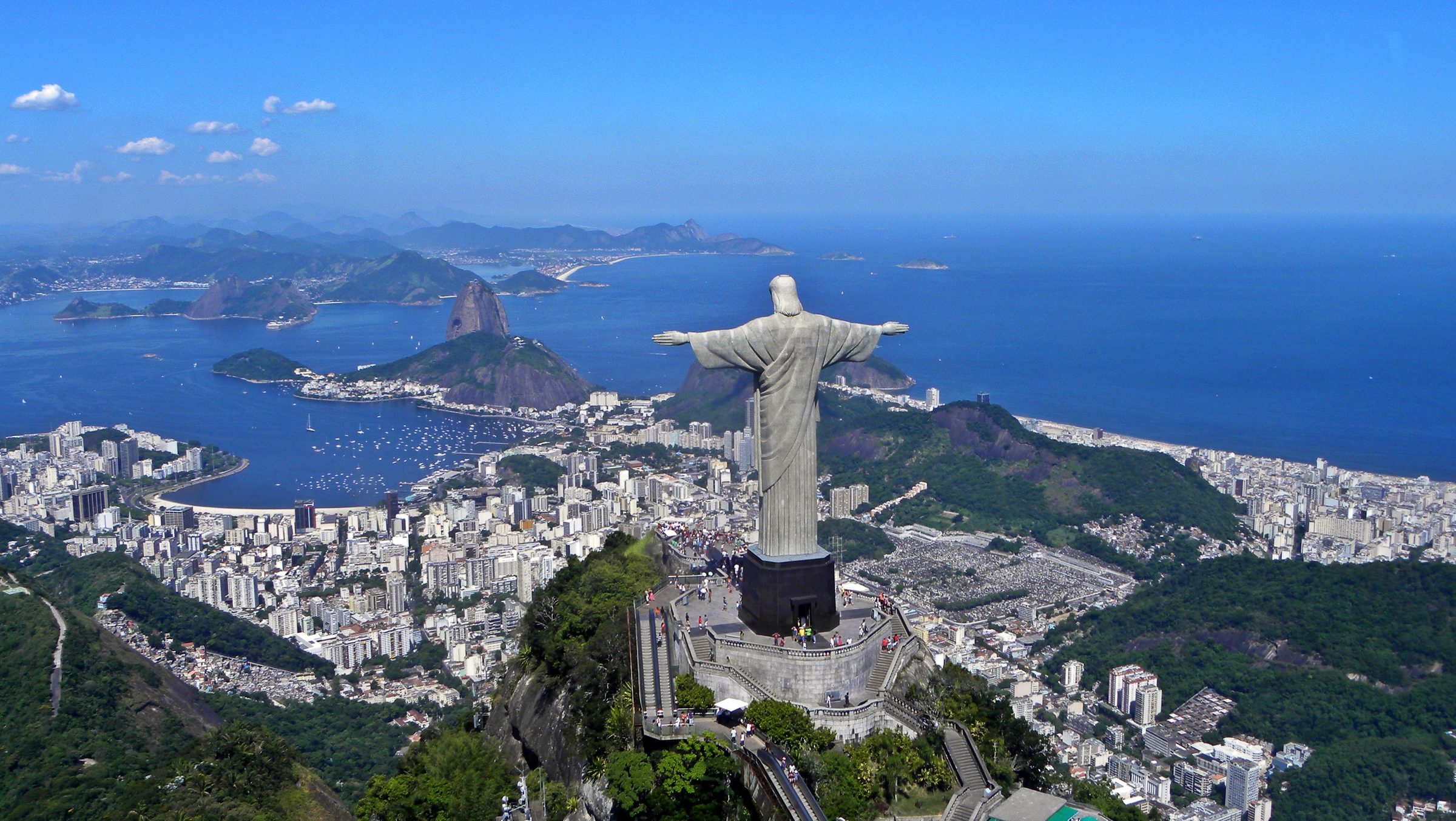 Christ the Redeemer at Corcovado, arms open over the South Atlantic.