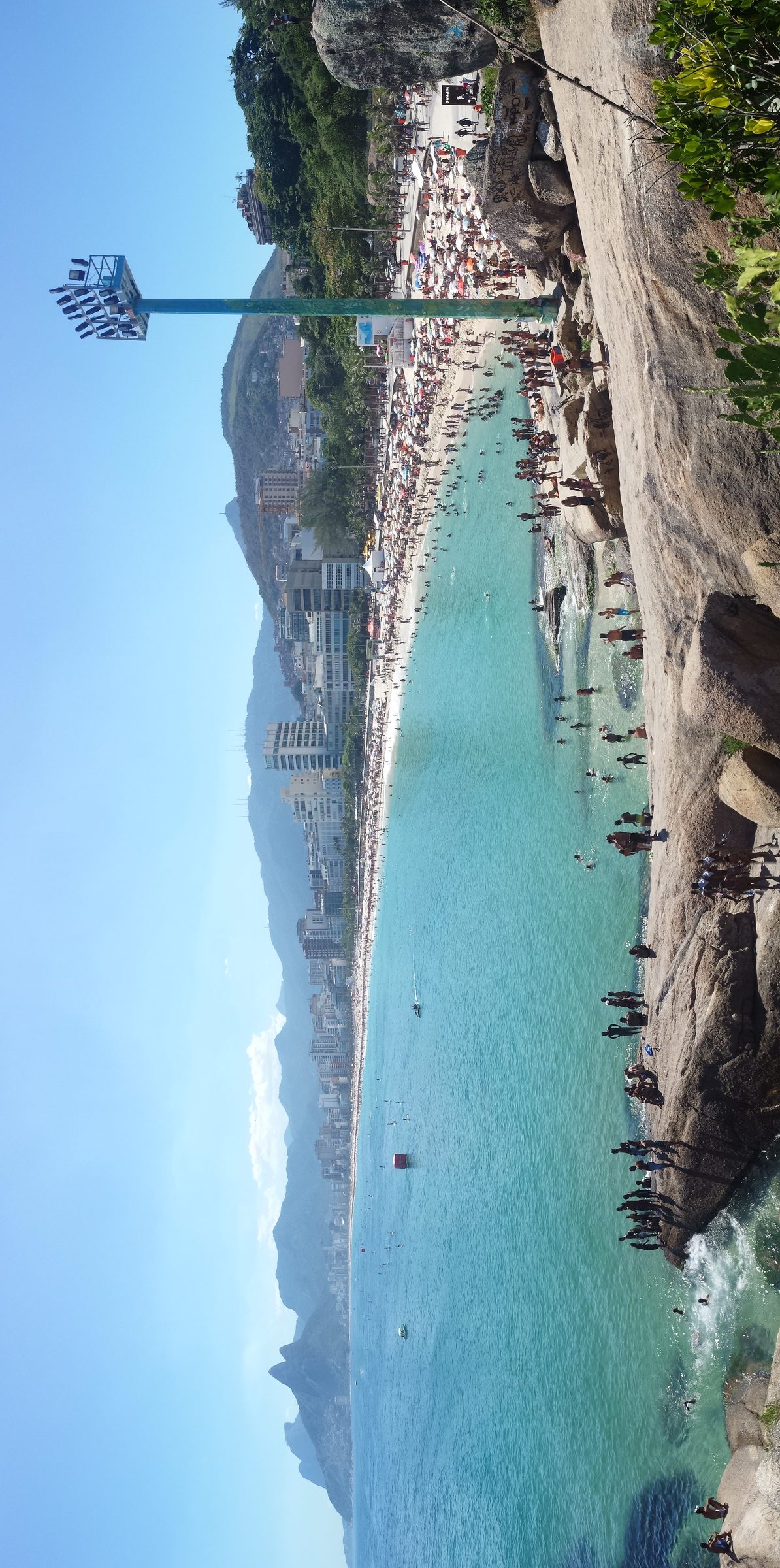 Ipanema and Leblon from the Arpoador rock — two miles of beach in one frame.